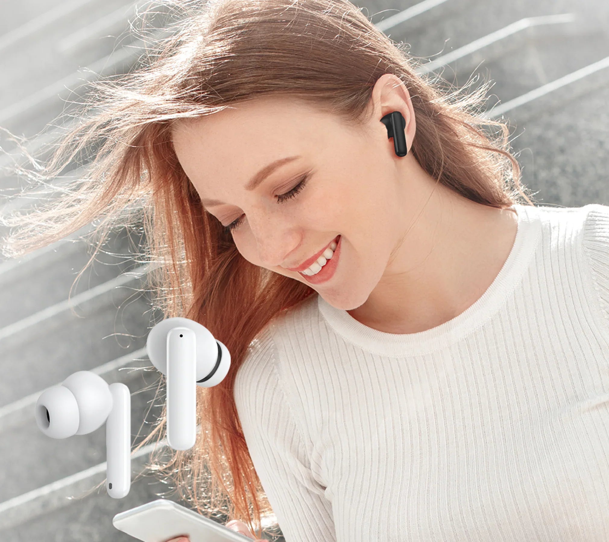 Écouteurs Bluetooth sans fil blancs – élégants, confortables et parfaits pour profiter de la musique en déplacement.