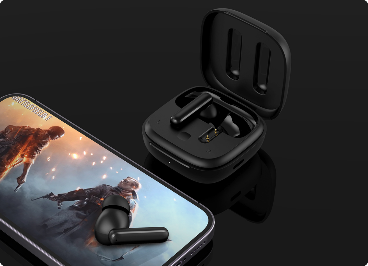 Écouteurs Bluetooth noirs avec étui de chargement à côté d'un smartphone, Battlefield 1 affiché à l'écran.