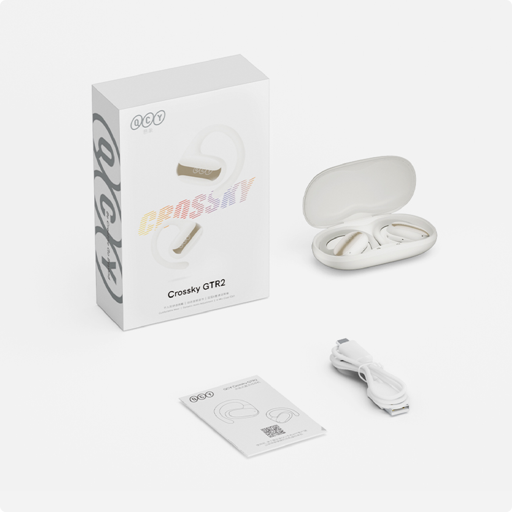 Écouteurs Bluetooth QCY Crossky GTR2 blancs avec étui de chargement, câble USB et manuel.