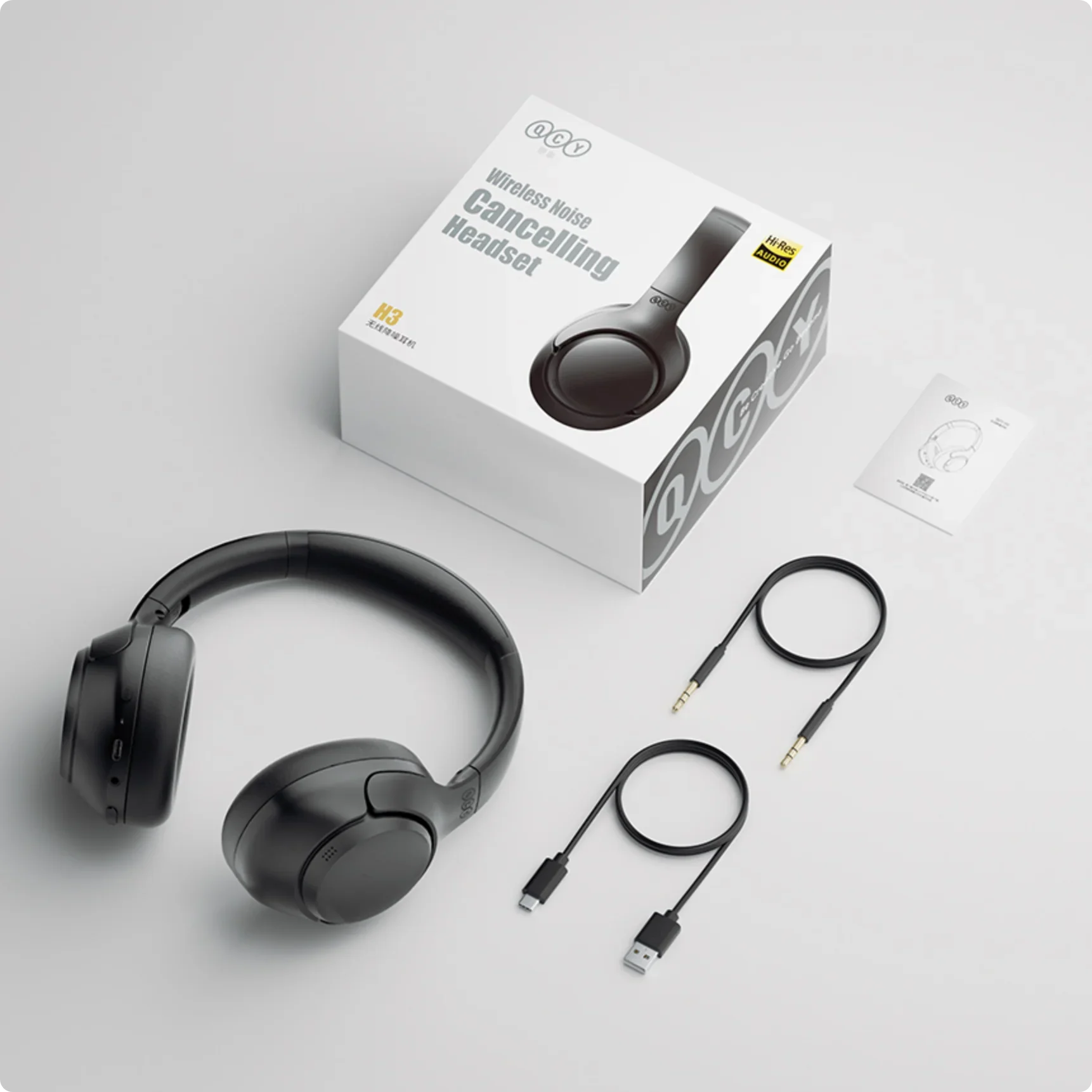 Casque sans fil à réduction de bruit QCY H3 avec audio Hi-Res, USB-C et câble AUX.