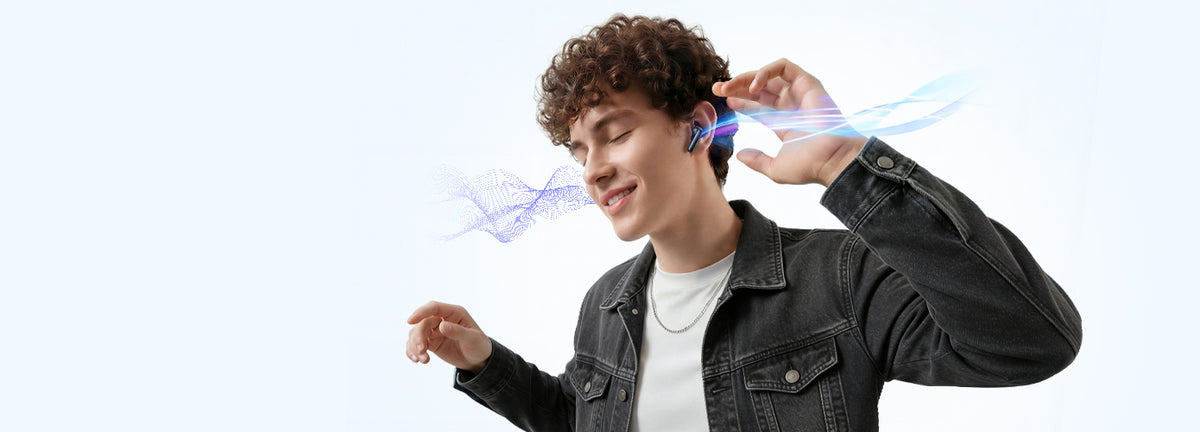 Homme avec des écouteurs sans fil, profitant de la musique, des ondes lumineuses bleues visualisent le son.
